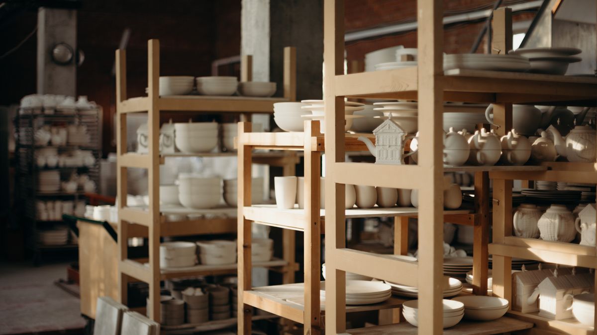 Unfired porcelain ware waiting on the shelves of an Arita workshop