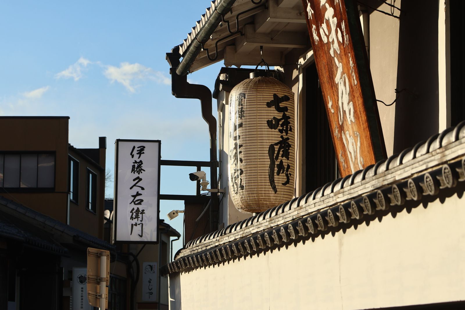 A quiet traditional street in northern Kyoto at dusk