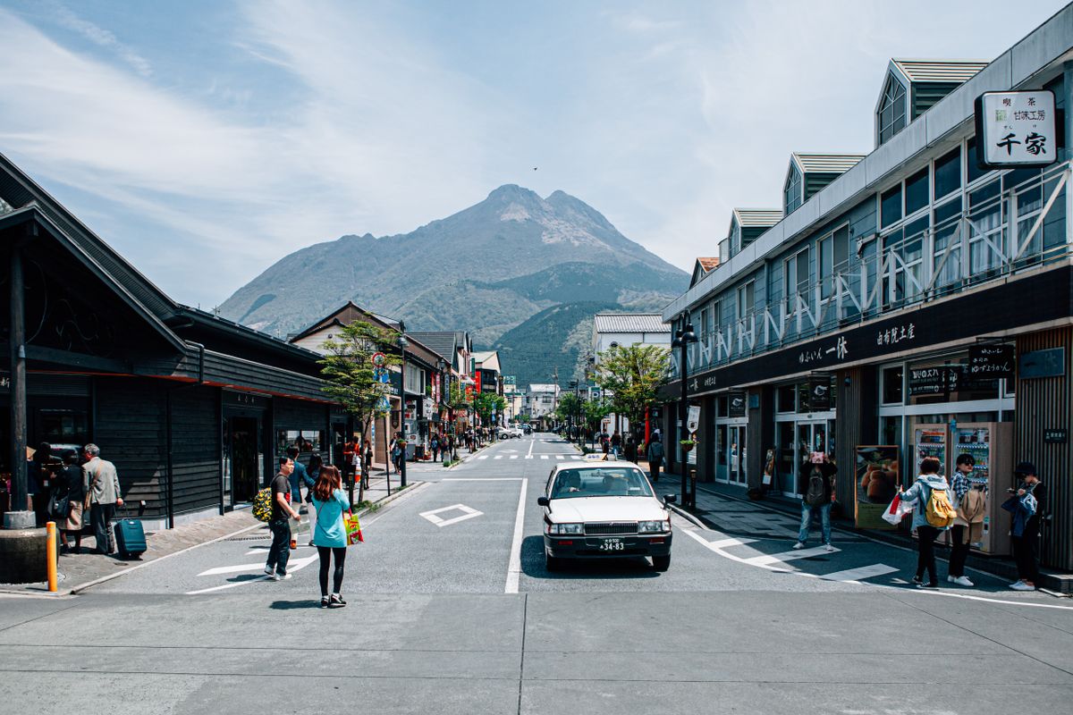 Yunotsubo Kaido, Yufuin's main street, with Mt. Yufu rising behind the shops
